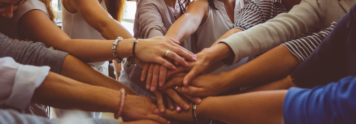 womens hands coming together