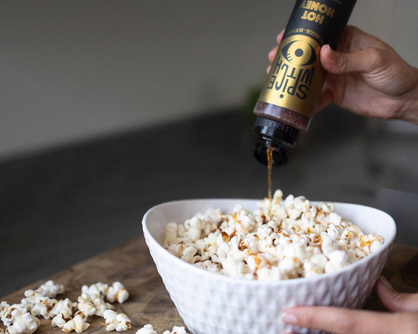 Spicy honey popcorn made with Spice Witch Hot Honey