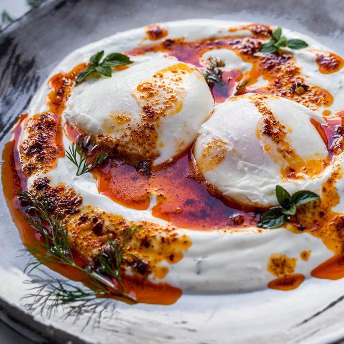 Cilbir Turkish eggs with Spice Witch chili crisp and yogurt