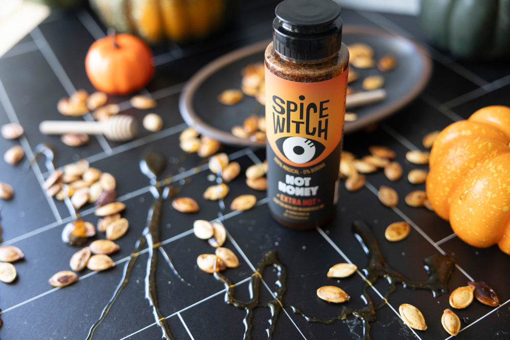 Spice Witch Extra Hot Honey with roasted pumpkin seeds and fall squash
