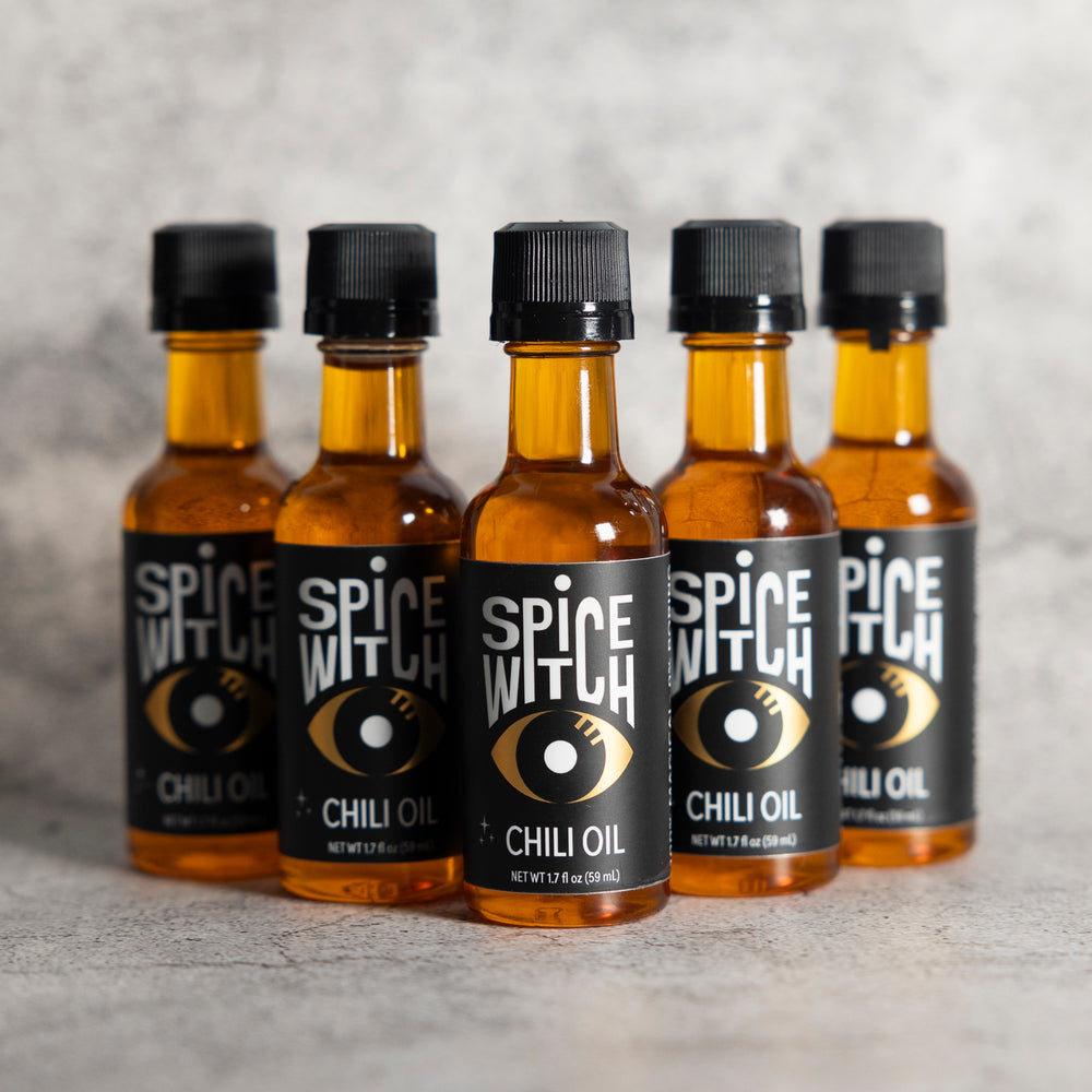 Spice Witch Chili Oil bundles include a 5-pack of 1.7 oz bottles, a 3-pack of 4 oz bottles, and a 3-pack of 8 oz bottles. Made with premium avocado oil, garlic, ginger, and aromatic spices, these versatile chili oils are perfect for cooking, drizzling, dipping, and enhancing meals with a spicy kick.