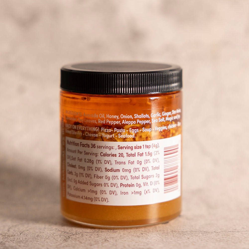 
                  
                    Jar of Spice Witch Chili Crisp with a Spicy Honey Twist, highlighting its unique combination of spicy, crunchy, and sweet flavors. Perfect for enhancing pizza, pasta, grilled meats, and more.
                  
                